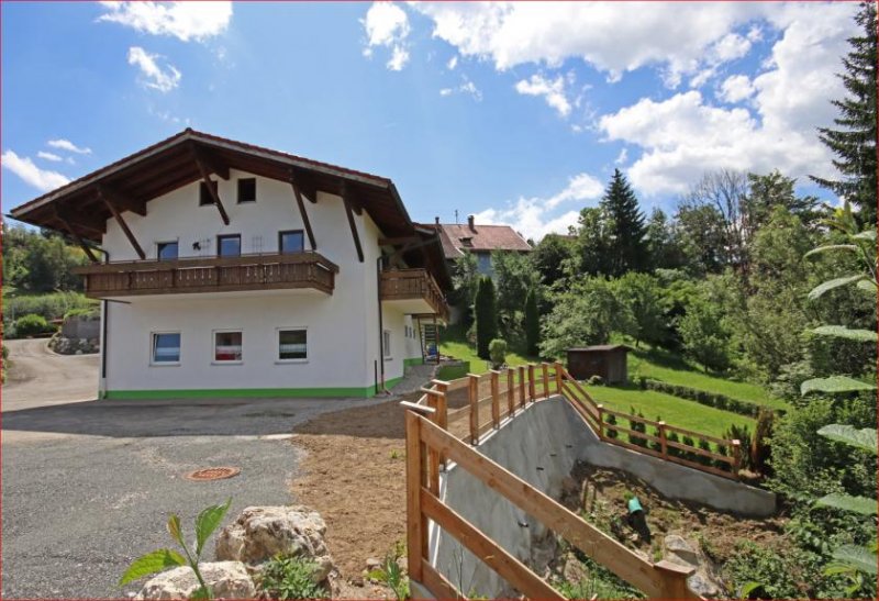 Wertach Zweifamilienhaus mit praktischen Nutzungsmöglichkeiten und naturnahem Flair Haus kaufen