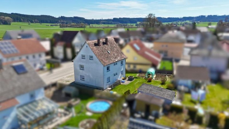 Aichstetten Kapitalanlage oder Eigennutzung: Mehrparteienhaus mit zwei Wohnungen und großem Grundstück Haus kaufen