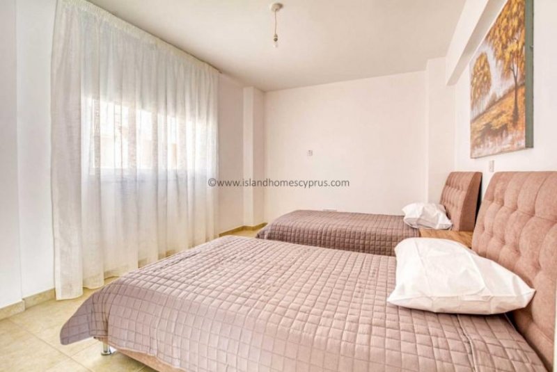 Kapparis 2 bedroom, 1 bathroom apartment in Kapparis - THE128AS.Set on a popular development with inviting communal swimming pool this