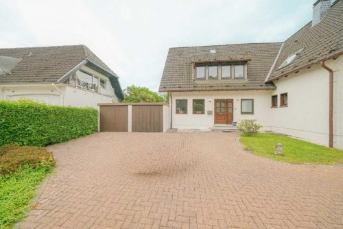 Ratingen Häuser Breitscheid: Einfamilienhaus mit Garten und 2 Garagen Haus 