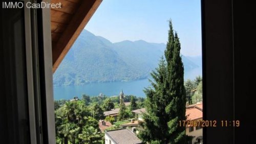 DRANO/Valsolda Immobilien Reizvolle und äusserst aufwändig ausgebaute Dachwohnung mit fantastischem Blick ganz weit über den Luganer See Wohnung kaufen