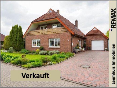 Bunde Immobilien Gepflegtes Einfamilienhaus mit parkähnlichem Garten in bester Lage von Bunde! Haus kaufen