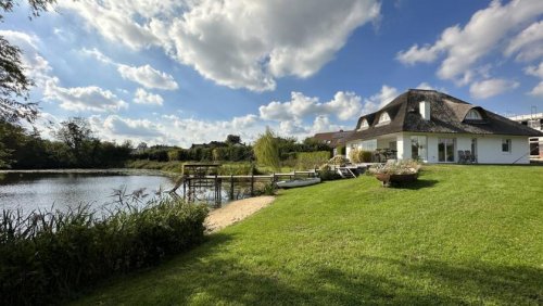 Kleve (Kreis Kleve) Immobilien Inserate Traumhaftes Reetdachhaus mit privatem See in Kleve-Rindern! Haus kaufen