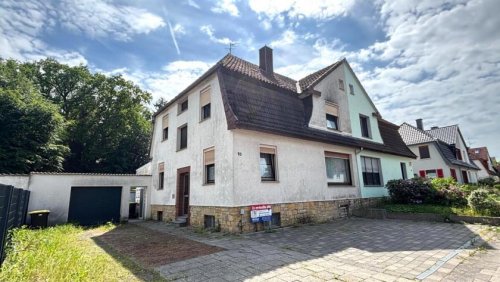 Osnabrück Immobilien Doppelhaushälfte mit 2 Wohneinheiten und Garagen in Osnabrück-Eversburg Haus kaufen