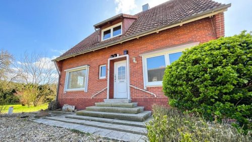 Neuenhaus Häuser Einfamilienhaus mit Einliegerwohnung in Neuenhaus; + Baugrundstück-Potenzial Haus kaufen
