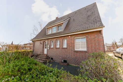 Uelsen Immobilien Kapitalanlage in Toplage von Uelsen – Vermietetes Einfamilienhaus mit Einliegerwohnung Haus kaufen