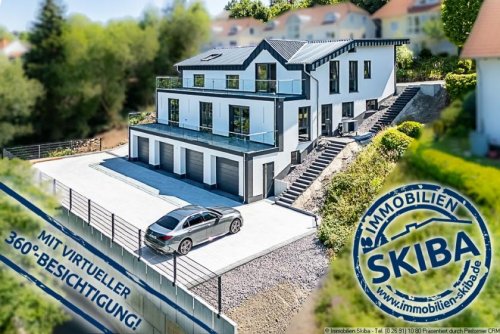 Daun Erstbezug: Moderne Neubau-Erdgeschoss-Eigentumswohnung mit 2 Garagen in Daun-Pützborn Wohnung kaufen