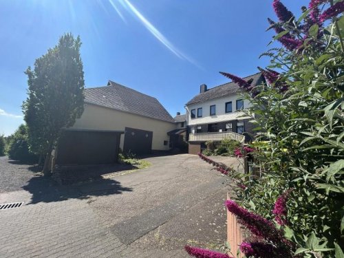 Macken Immobilien Wohnhaus mit großen Lagerräumen und Parkflächen (für Handwerksbetrieb geeignet) mit Photovoltaik 9 kWp Haus kaufen