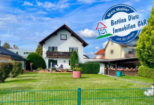 Schaafheim Immobilien Großzügiges Zweifamilienhaus mit sonnigem Garten, Terrasse und Garage in idyllischer Feldrandlage Haus kaufen