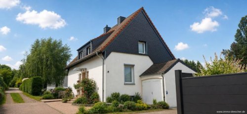 Saarbrücken Immobilien Ein besonderes Zuhause in Höhenlage – mit Panoramablick, Wellnessbereich und Gartenidylle Haus kaufen