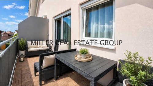 Kösching Wohnungen Großzügige 5-Zimmer-Maisonette-Wohnung mit Balkon und zwei Stellplätzen in gefragter Lage von Kösching bei Ingolstadt kaufen