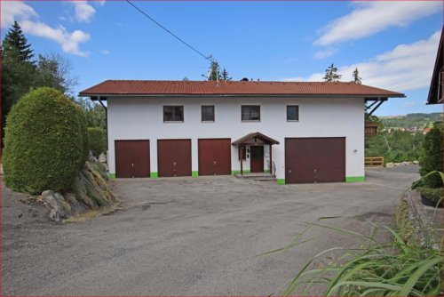Wertach Immobilien Zweifamilienhaus mit praktischen Nutzungsmöglichkeiten und naturnahem Flair Haus kaufen