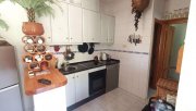 Orihuela Costa Sehr schönes Endreihenhaus mit 2 Schlafzimmern, 2 Bädern, Gästebereich im Souterrain, Dachterrasse und Gemeinschaftspool Haus