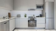 Punta Prima Appartements mit 3 Schlafzimmern, 2 Bädern, Klimaanlage, Fußbodenheizung in Bädern, Tiefgaragen-Stellplatz und Meerblick nur