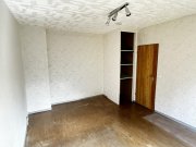 Mülsen Sanierungsbedürftige 3-Raumwohnung mit Stellplatz und Balkon in Mülsen! Wohnung kaufen