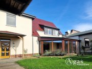 Küstriner Vorland Vielseitiges Anwesen: Wohnhaus mit Wintergarten, großer Werkstatt (ca. 350 m²) und Doppelgarage Haus kaufen