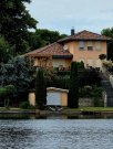 Woltersdorf (Landkreis Oder-Spree) Einzigartiges Wassergrundstück mit Haus und Bootshaus am Kalksee - OHNE MAKLER Haus kaufen