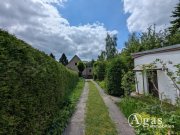 Melchow Sonniges Baugrundstück mit Ferienhaus und Garage - direkte Waldrandlage in Melchow Grundstück kaufen