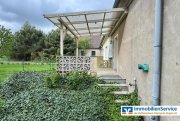 Dreetz (Landkreis Ostprignitz-Ruppin) Wohnen, wo der Wald beginnt – charmantes Reihenendhaus mit Garten Haus kaufen
