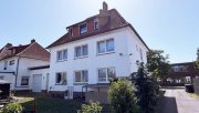 Hamburg HAMBURGER DREIFAMILIENHAUS MIT 12 GARAGEN, LAUFENDEN MIETEINNAHMEN UND ENTWICKLUNGSPOTENZIAL! Haus kaufen
