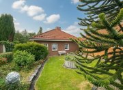 Diekhusen-Fahrstedt Walmdachbungalow in Marne - Stilvolles Wohnen mit Gartenblick und Wintergarten! Haus kaufen