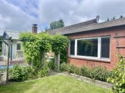 Lohe-Rickelshof Wohnen auf einer Ebene in Lohe-Rickelshof: Bungalow mit Einliegerwohnung und Wintergarten Haus kaufen