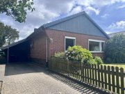 Lohe-Rickelshof Wohnen auf einer Ebene in Lohe-Rickelshof: Bungalow mit Einliegerwohnung und Wintergarten Haus kaufen