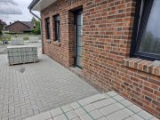 Esens Esens - ruhige Innenstadt-Lage: Neubau Ferienwohnung im Erdgeschoss mit Terrasse Wohnung kaufen