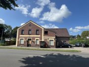 Aurich 2 Häuser (8 Wohnungen), Doppelgarage und 12 PKW-Stellplätze - Rendite! Haus kaufen