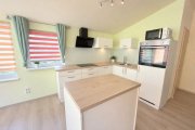 Südbrookmerland Möbliertes Ferienhaus mit Boot und Fass-Sauna am Wasser! Haus kaufen