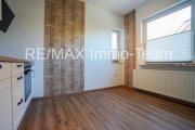 Rhauderfehn Kapitalanlage mit Potenzial: Dreiparteienhaus in gefragter Lage von Holte! Haus kaufen