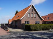Rhauderfehn Kapitalanlage mit Potenzial: Dreiparteienhaus in gefragter Lage von Holte! Haus kaufen