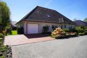 Weener Gepflegtes Einfamilienhaus mit Südterrasse, moderner Küche & Ausbaureserve in top Lage von Weener! Haus kaufen