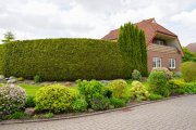 Bunde Gepflegtes Einfamilienhaus mit parkähnlichem Garten in bester Lage von Bunde! Haus kaufen