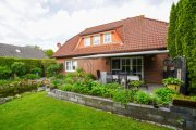 Bunde Gepflegtes Einfamilienhaus mit parkähnlichem Garten in bester Lage von Bunde! Haus kaufen