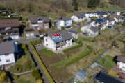 Bad Endbach ++ KRAG Immobilien ++ Zweifamilienhaus mit vermieteter Wohnung und Doppelgarage Haus kaufen