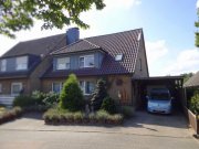 Emmerich am Rhein Emmerich: Kapitalanlage - Zweifamilienhaus mit schönem Garten und großer Garage Haus kaufen