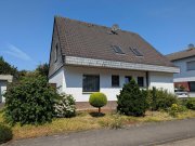 Alpen Freistehendes Einfamilienhaus mit Garten, Balkon und Garage in ruhiger Wohnlage Haus kaufen