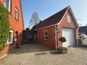 Uelsen Zentral in Uelsen – Großzügiges Einfamilienhaus mit Nebengebäuden; ebenerdiges Wohnen möglich Haus kaufen