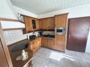 Uelsen Zentral in Uelsen – Großzügiges Einfamilienhaus mit Nebengebäuden; ebenerdiges Wohnen möglich Haus kaufen