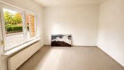 Uelsen Zwei Wohneinheiten, viele Möglichkeiten – gepflegtes Zweifamilienhaus in Uelsen Haus kaufen