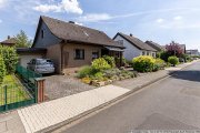 Rheinbach Ruhiges Wohngebiet: Gepflegtes Wohnhaus mit Garten und Garage auf Erbpachtgrund in Oberdrees Haus kaufen
