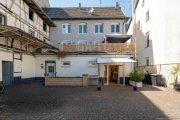 Bad Neuenahr-Ahrweiler Value-Add-Investment: Historisches Wohn- und Geschäftshaus mit Ausbaupotenzial in 1A-Innenstadtlage Haus kaufen