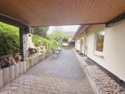 Wissen CITYHOUSE: Großzügiges Zweifamilienhaus mit Ausbaupotenzial, Garten & 3 Garagen Haus kaufen