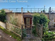 Caldana Großzügiges Wohnhaus mit Garten, Dachterrasse und fünf Garagen Haus kaufen