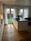 Bruchköbel Exklusive barrierefreie Neubauwohnung mit 185 m² Privatgarten, Tiefgarage, Aufzug und hochwertiger Ausstattung Wohnung kaufen