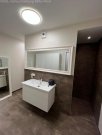 Bruchköbel Exklusive barrierefreie Neubauwohnung mit 185 m² Privatgarten, Tiefgarage, Aufzug und hochwertiger Ausstattung Wohnung kaufen