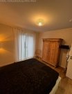 Bruchköbel Exklusive barrierefreie Neubauwohnung mit 185 m² Privatgarten, Tiefgarage, Aufzug und hochwertiger Ausstattung Wohnung kaufen
