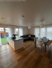 Bruchköbel Exklusive barrierefreie Neubauwohnung mit 185 m² Privatgarten, Tiefgarage, Aufzug und hochwertiger Ausstattung Wohnung kaufen