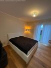 Bruchköbel Exklusive barrierefreie Neubauwohnung mit 185 m² Privatgarten, Tiefgarage, Aufzug und hochwertiger Ausstattung Wohnung kaufen